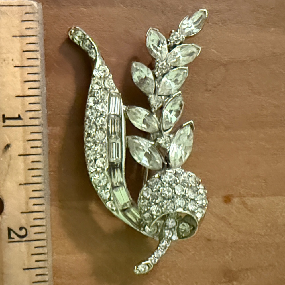 Vintage pin - rhinestone ribbon wrapped around branch with crystal leaves